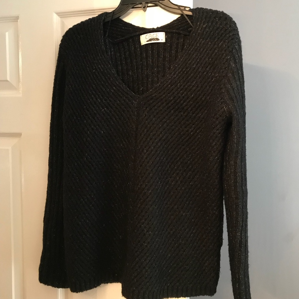 Black sweater. Like new. Worn once. Size M